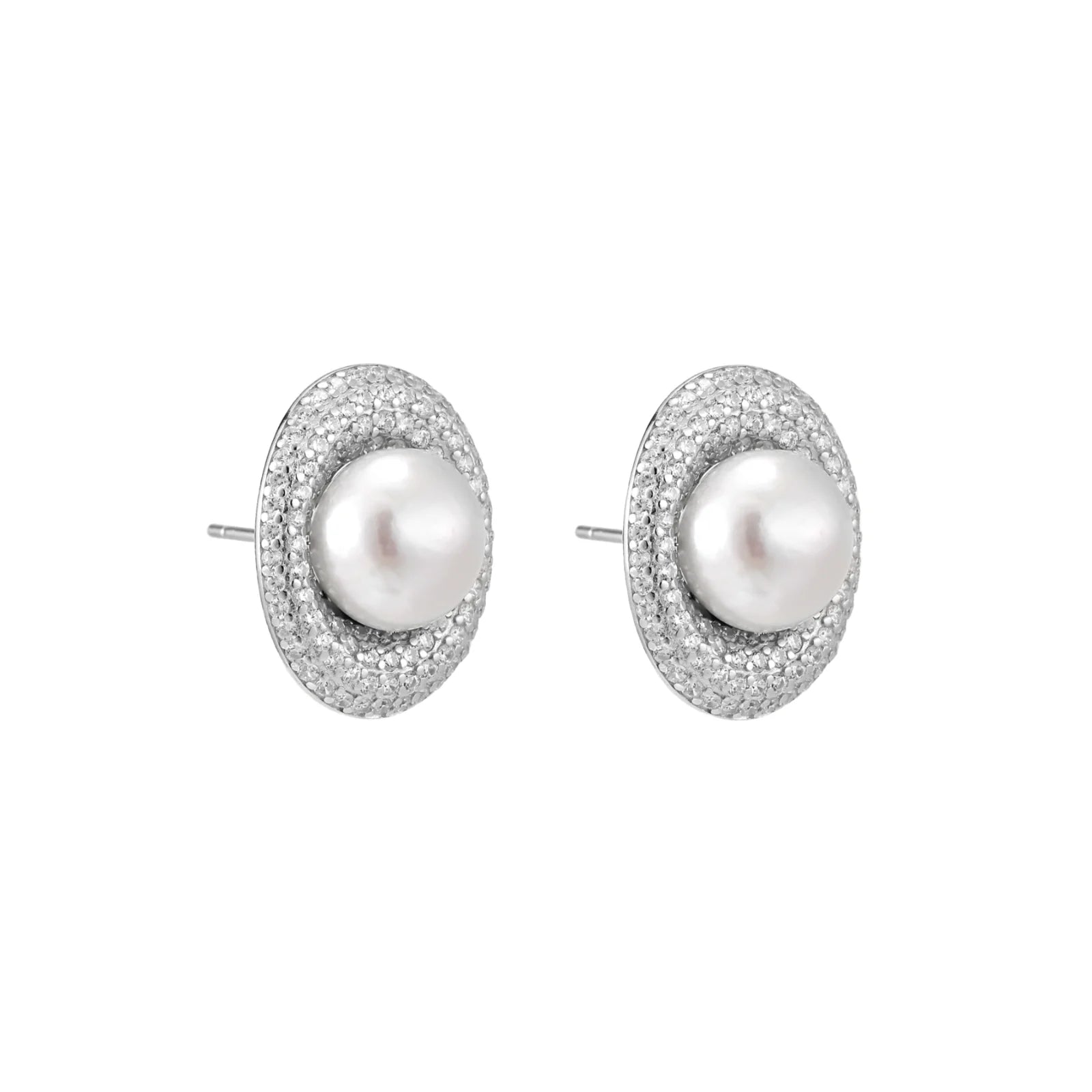Oval rhodium-plated silver studs featuring freshwater pearls surrounded by pavé crystal halo on white background