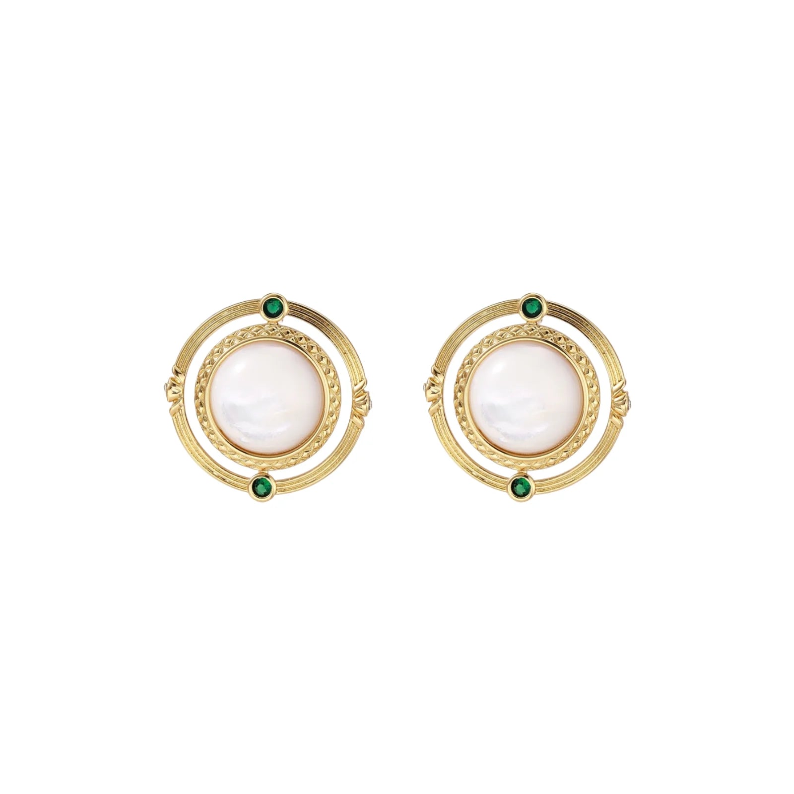 Circular gold stud earrings with iridescent mother-of-pearl center and green zirconia accents on cream background.