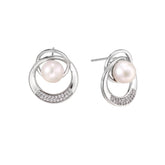 White gold-plated brass earrings with circular design, freshwater pearl center, and diamond accents
