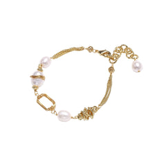 14K gold plated bracelet with freshwater pearls, filigree details, and mixed geometric elements on white background.