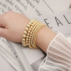 New Fashion Accessories Women' Gifts Simple Smooth Round Beads Black Ore Plated 14k Gold Elastic Hand Beads Multi-layer Bracelet