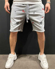 Embroidered shorts beggar pants men's pants