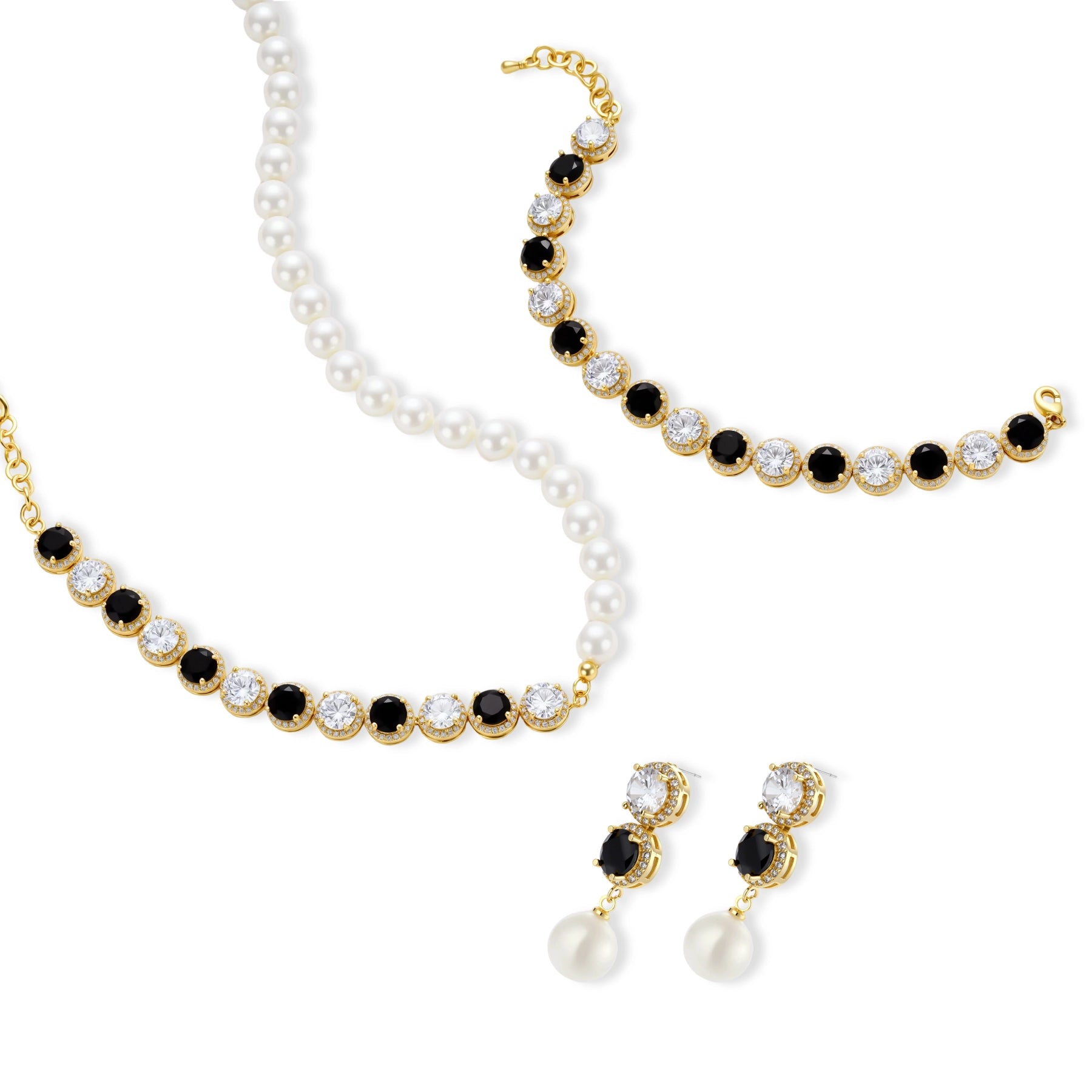 Gold-plated jewelry set with alternating black and clear cubic zirconia stones, featuring necklace, earrings and bracelet