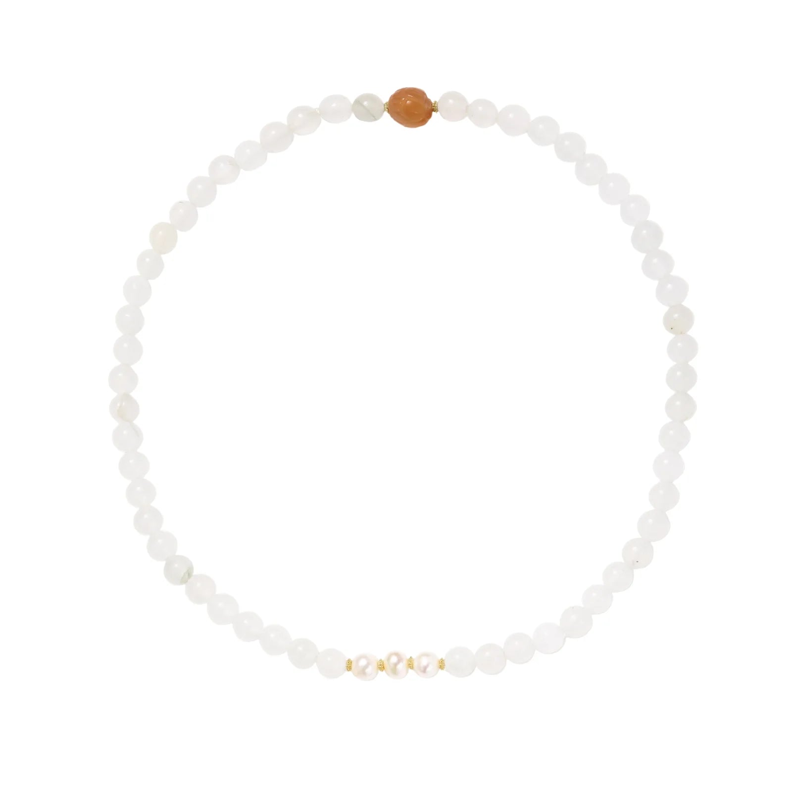 Three layered white beaded bracelets with carved orange agate lotus centerpiece and freshwater pearls on cream background.