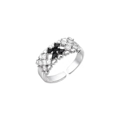 White gold plated adjustable ring with three rows of square zirconia stones in black or pink chevron pattern