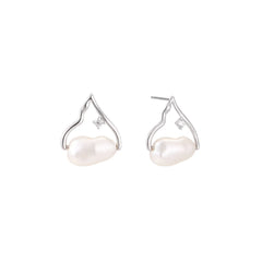 Silver mountain outline studs with baroque pearl and diamond accent on white background