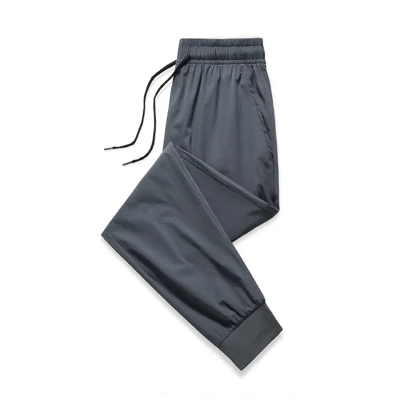 Spring and Summer Men's Thin Senior Ice Silk Breathable Casual Pants Loose Quick Drying Men's Pants Sports Nine-point Pants Men